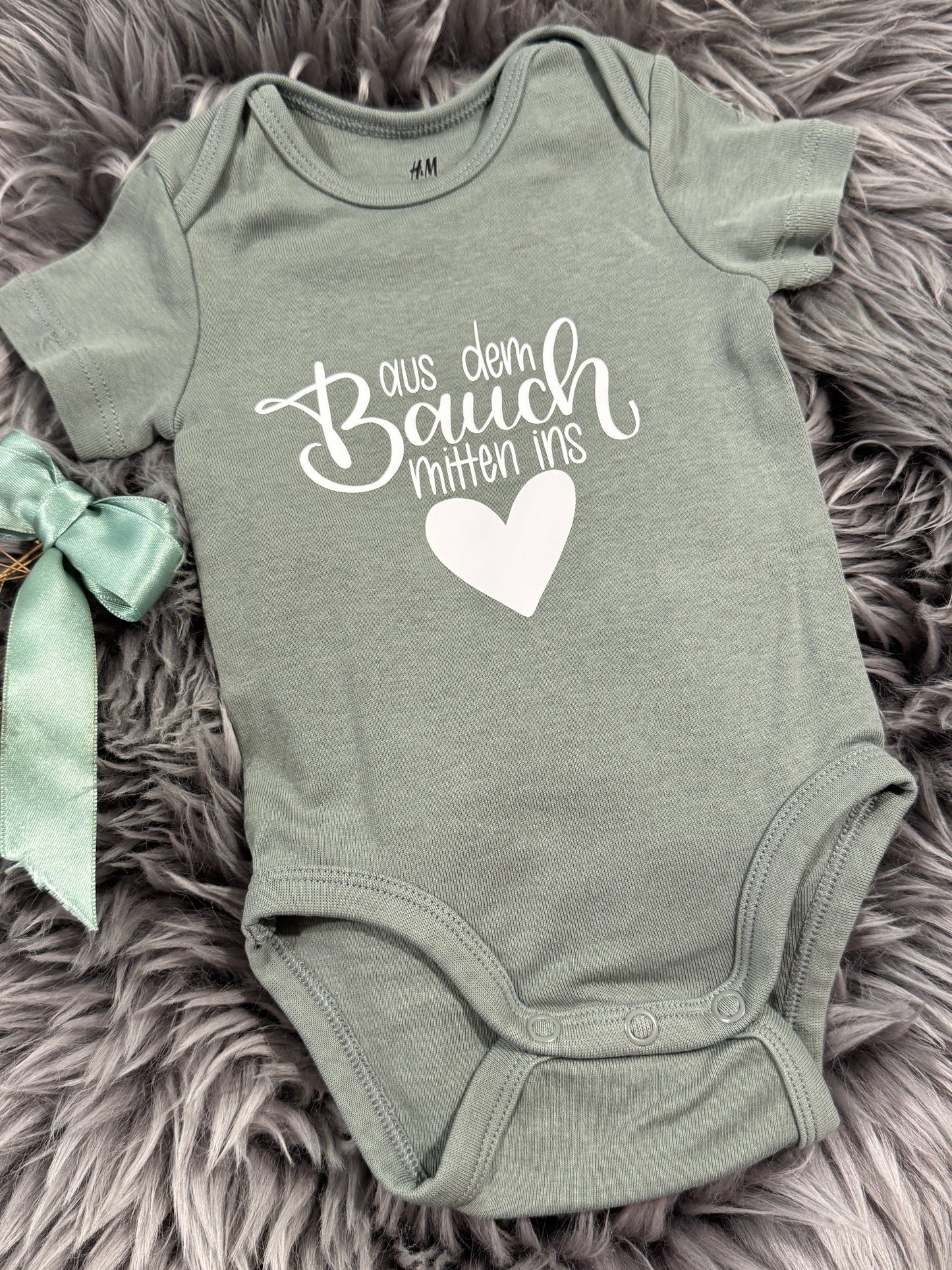 Baby-Body aus dem Bauch mitten ins đ€