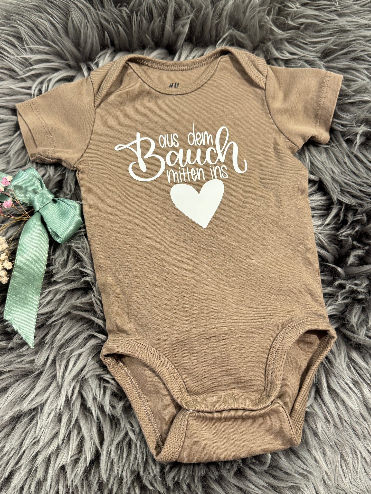 Baby-Body aus dem Bauch mitten ins đ€